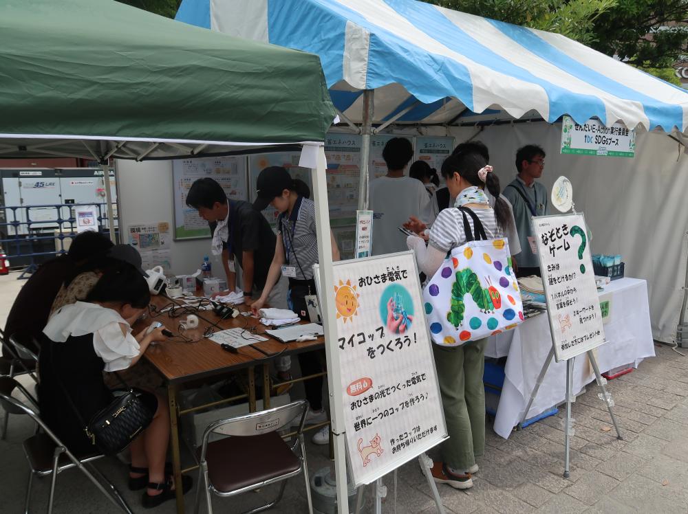 tbc夏まつり2025に出展したE-Action実行委員会のブースの様子